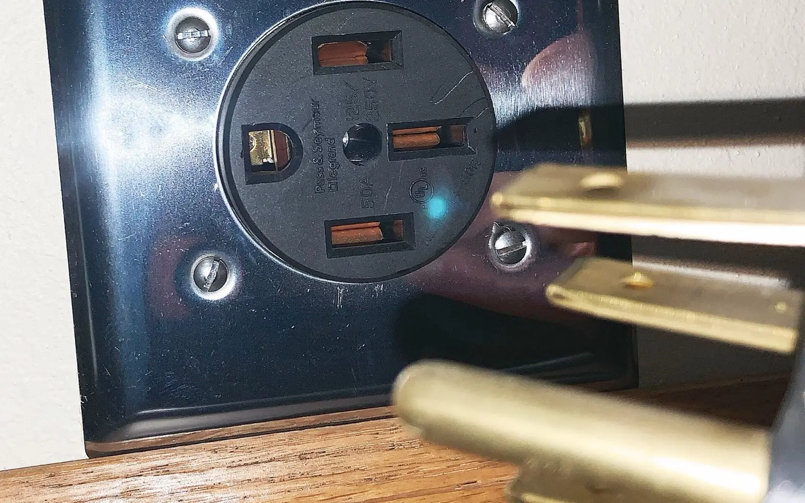 A NEMA 14-50 240-volt AC outlet used for Level 2 EV charging.